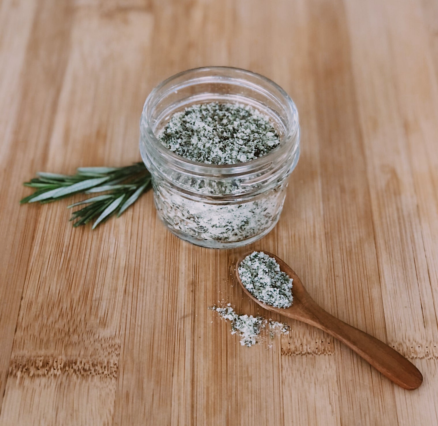 fresh rosemary salt in glass jar container